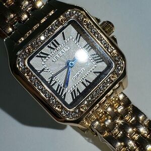 Gold and Silver Watch with Blue Accents